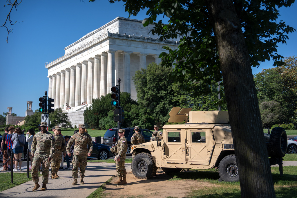National Guard members stand near the Lincoln Memorial on Tuesday, June 2, 2026, in Washington. (AP Photo/Mark Schiefelbein)