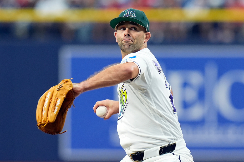 Tampa Bay Rays pitcher Nick Martinez goes into his windup against the Cleveland Guardians during the first inning of a baseball game Saturday, July 25, 2026, in St. Petersburg, Fla. (AP Photo/Chris O'Meara)