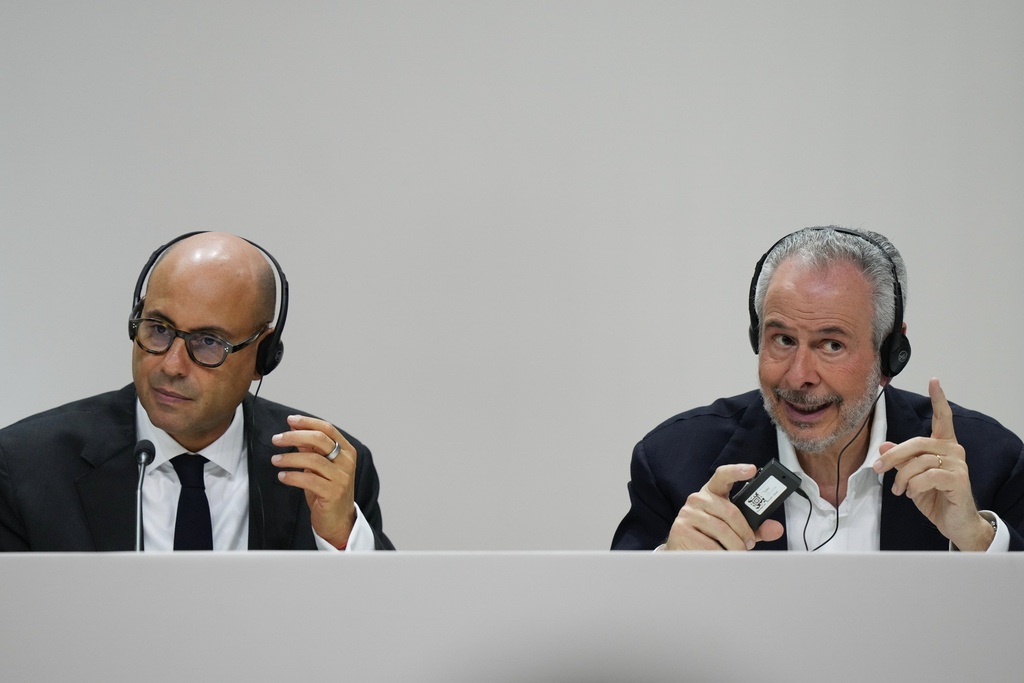 Simon Stiell, United Nations climate chief, left, listens as André Corrêa do Lago, COP30 president, speaks during a news conference at the COP30 U.N. Climate Summit, Monday, Nov. 10, 2025, in Belem, Brazil. (AP Photo/Fernando Llano)