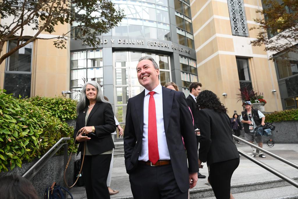 Jason Slothouber, Senior Prosecutor for the Colorado Attorney General's Office, walks outside court after tech giant Meta reached a settlement to end a landmark trial over teen social media addiction on Wednesday, Aug. 26, 2026, in Oakland, Calif. (AP Photo/Noah Berger)