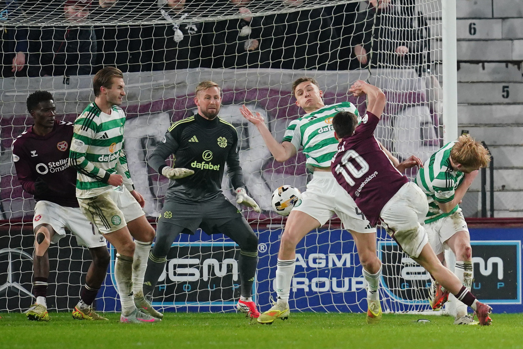 Heart of Midlothian's Claudio Braga, second right, scores their side's second goal of the game during the William Hill Premiership match in Edinburgh, Scotland, Sunday Jan. 25, 2026. (Jane Barlow/PA via AP)
