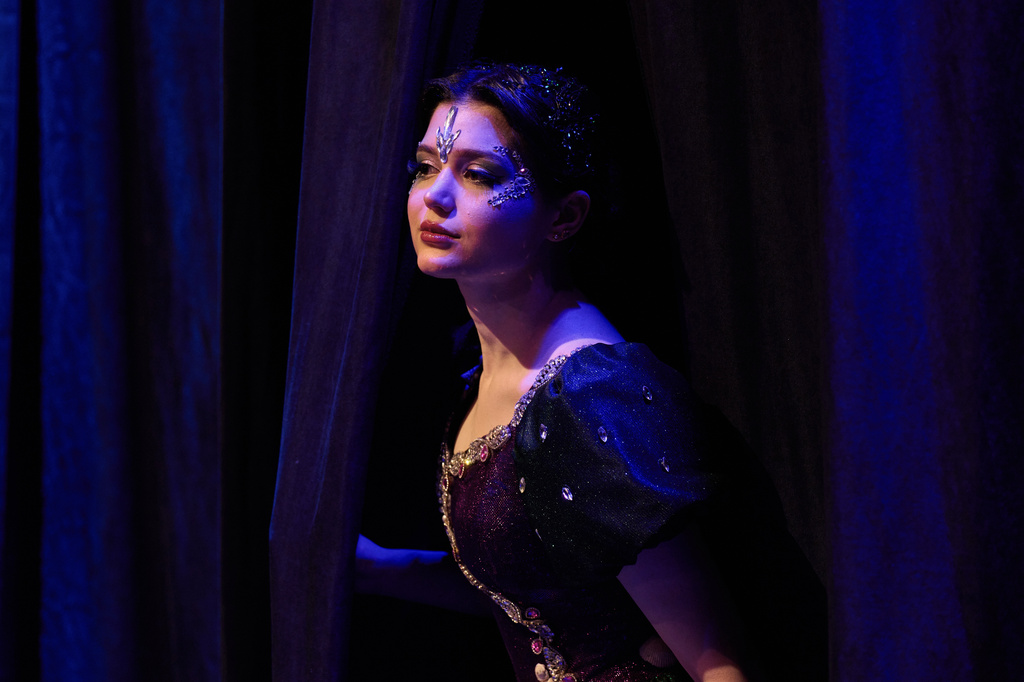 A Baghdad Ballet Academy student waits in the wings to perform in a production titled "Mermaid" at Al-Sinbad Theater in Baghdad, Iraq, Friday, Sept. 25, 2026. (AP Photo/Hadi Mizban)