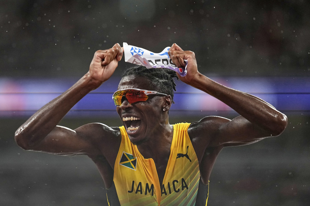 Jamaica's Navasky Anderson reacts after finishing a men's 800 meters semifinal at the World Athletics Championships in Tokyo, Thursday, Sept. 18, 2025. (AP Photo/Petr David Josek)