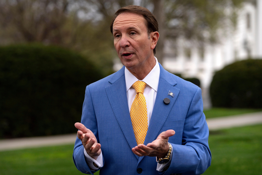 FILE - Louisiana Gov. Jeff Landry records a social media video outside the White House in Washington, on March 24, 2025. (AP Photo/Mark Schiefelbein, File)