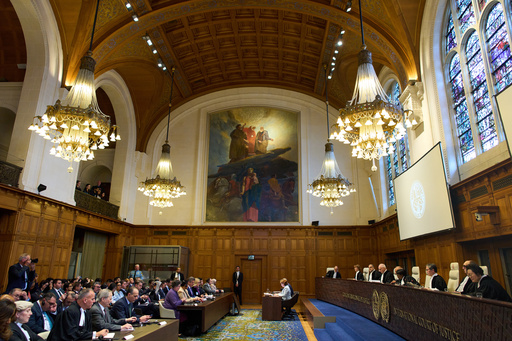 Presiding Judge Yuji Iwasawa, third from right, starts reading the advisory opinion of the International Court of Justice on what Israel must do to ensure humanitarian aid reaches Palestinians in Gaza and the occupied West Bank, in The Hague, Netherlands, Wednesday, Oct. 22, 2025. (AP Photo/Peter Dejong) Presiding Judge Yuji Iwasawa, third from right, starts reading the advisory opinion of the International Court of Justice on what Israel must do to ensure humanitarian aid reaches Palestinians in Gaza and the occupied West Bank, in The Hague, Netherlands, Wednesday, Oct. 22, 2025. (AP Photo/Peter Dejong)