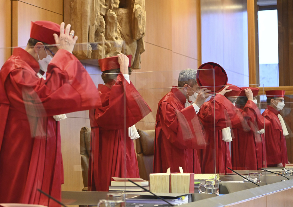 FILE - Judges arrive for a meeting of the First Senate at the Federal Constitutional Court in Karlsruhe, Germany, Tuesday, Dec. 14, 2021. (Uli Deck/dpa via AP, File)
