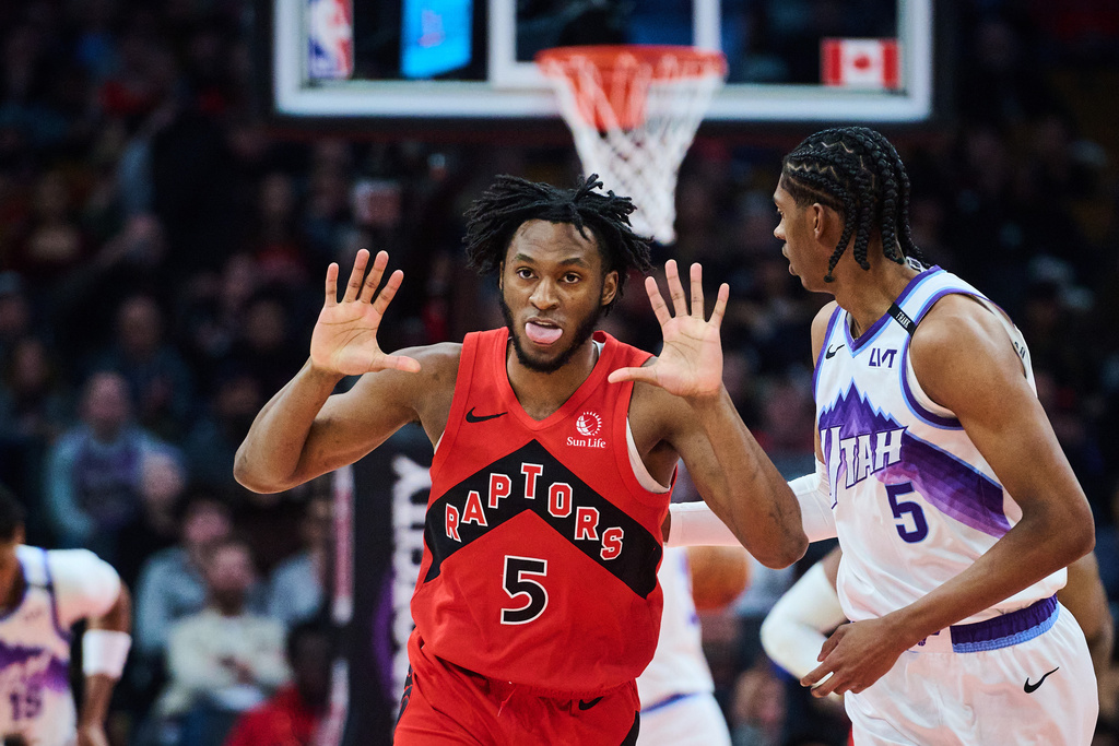 Toronto Raptors' Immanuel Quickley (5) reacts after a 3-point basket against the Utah Jazz during first-half NBA basketball game action in Toronto, Sunday, Feb. 1, 2026. (Sammy Kogan/The Canadian Press via AP)