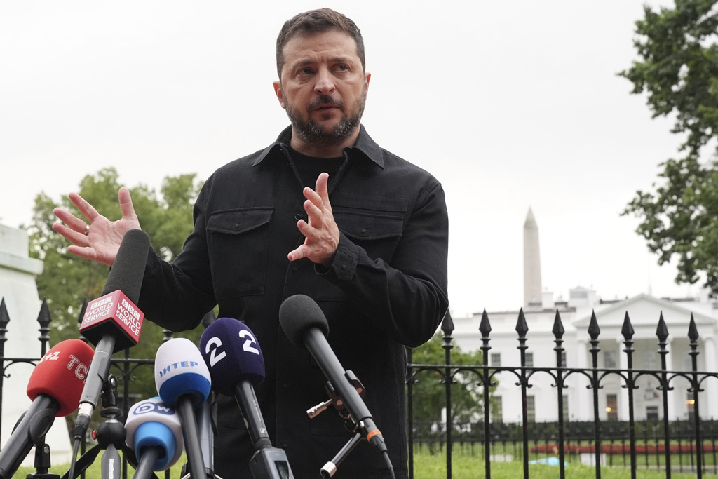 Ukraine's President Volodymyr Zelenskyy speaks in Lafayette Park, across from the White House, after meeting with President Donald Trump and European leaders Monday, Aug. 18, 2025, in Washington. (AP Photo/Jacquelyn Martin)