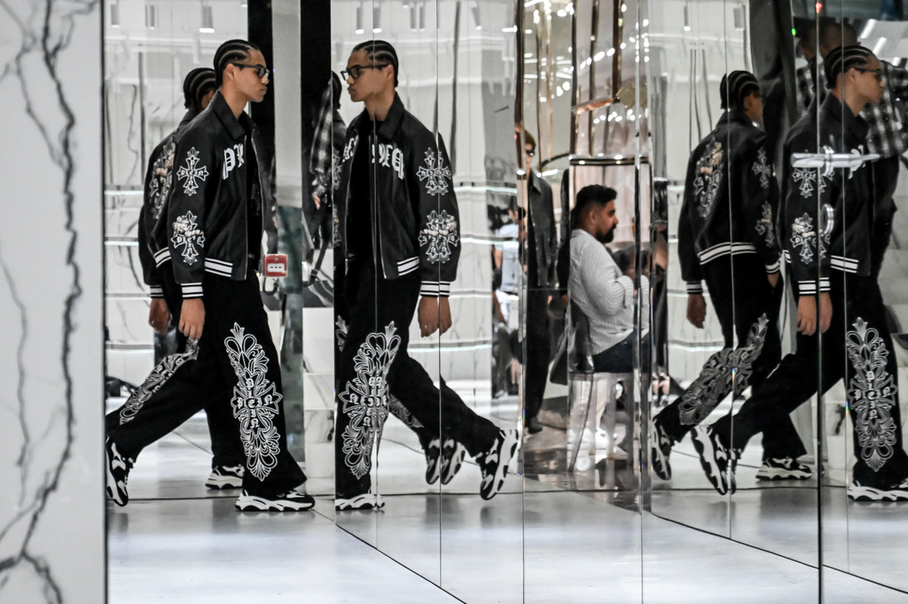 Models wear creations from the Philipp Plein's Spring/Summer 2027 Men's collection presented in Milan, Italy, Saturday, June 20, 2026. (AP Photo/Nicola Marfisi)
