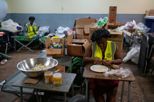 Cooks prepare meals at a shelter set up in a school ahead of Hurricane Melissa's forecast arrival in Old Harbour, Jamaica, Monday, Oct. 27, 2025. (AP Photo/Matias Delacroix) Cooks prepare meals at a shelter set up in a school ahead of Hurricane Melissa's forecast arrival in Old Harbour, Jamaica, Monday, Oct. 27, 2025. (AP Photo/Matias Delacroix)
