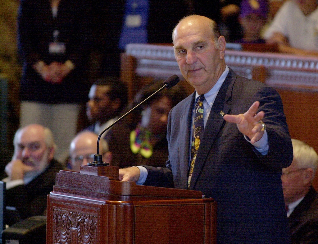 FILE - Louisiana State baseball coach Skip Bertman addresses the state House of Representatives at the Capitol in Baton Rogue, La., June 21, 2000. (AP Photo/Bill Haber, file)