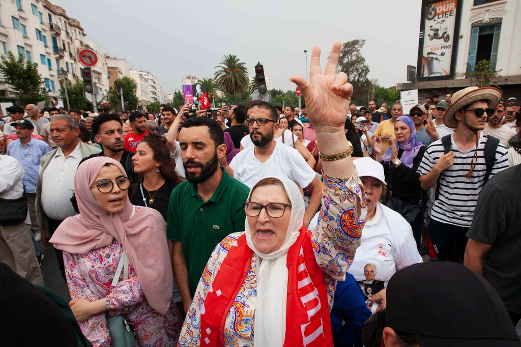 People take part in a demonstration against President Kais Saied in downtown Tunis, Tunisia, Saturday, July 25, 2026. (AP Photo/Ons Abid)