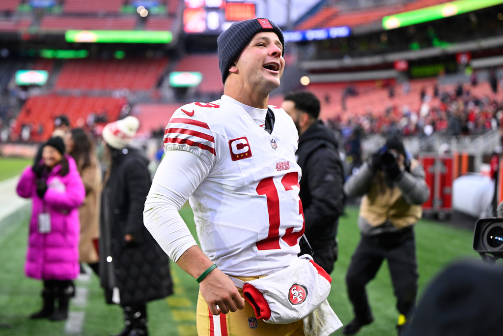 San Francisco 49ers quarterback Brock Purdy (13) celebrates after an NFL football game against the Cleveland Browns, Sunday, Nov. 30, 2025, in Cleveland. (AP Photo/David Richard)