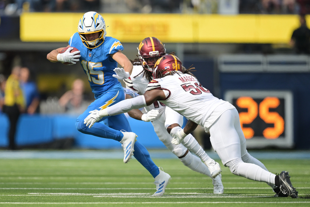 Los Angeles Chargers wide receiver Ladd McConkey (15) runs after a catch during the first half of an NFL football game against the Washington Commanders, Sunday, Oct. 5, 2025, in Inglewood, Calif. (AP Photo/Carrie Giordano) Los Angeles Chargers wide receiver Ladd McConkey (15) runs after a catch during the first half of an NFL football game against the Washington Commanders, Sunday, Oct. 5, 2025, in Inglewood, Calif. (AP Photo/Carrie Giordano)