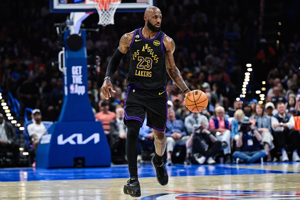 Los Angeles Lakers forward LeBron James (23) drives the ball during the first half of an NBA basketball game against the Oklahoma City Thunder Thursday, April. 2, 2026, in Oklahoma City. (AP Photo/Gerald Leong)