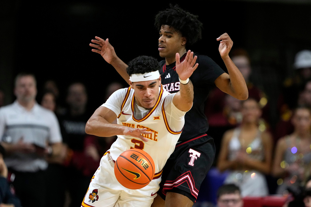 Iowa State guard Tamin Lipsey (3) is fouled by Texas Tech guard Christian Anderson during the first half of an NCAA college basketball game, Saturday, Feb. 28, 2026, in Ames, Iowa. (AP Photo/Charlie Neibergall)