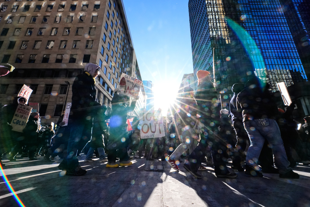 EDS NOTE: OBSCENITY - People gather during a protest Friday, Jan. 30, 2026, in Minneapolis. (AP Photo/Alex Brandon)