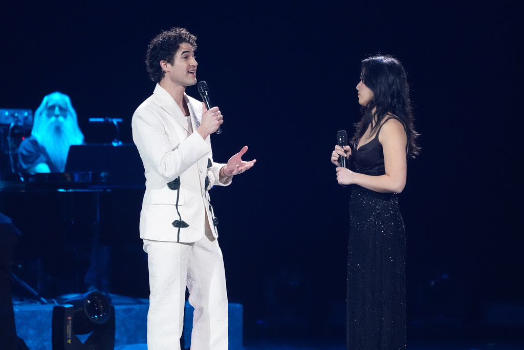 Darren Criss, left, and Helen J. Shen perform "Never Fly Away" during the 68th annual Grammy Awards on Sunday, Feb. 1, 2026, in Los Angeles. (AP Photo/Chris Pizzello)