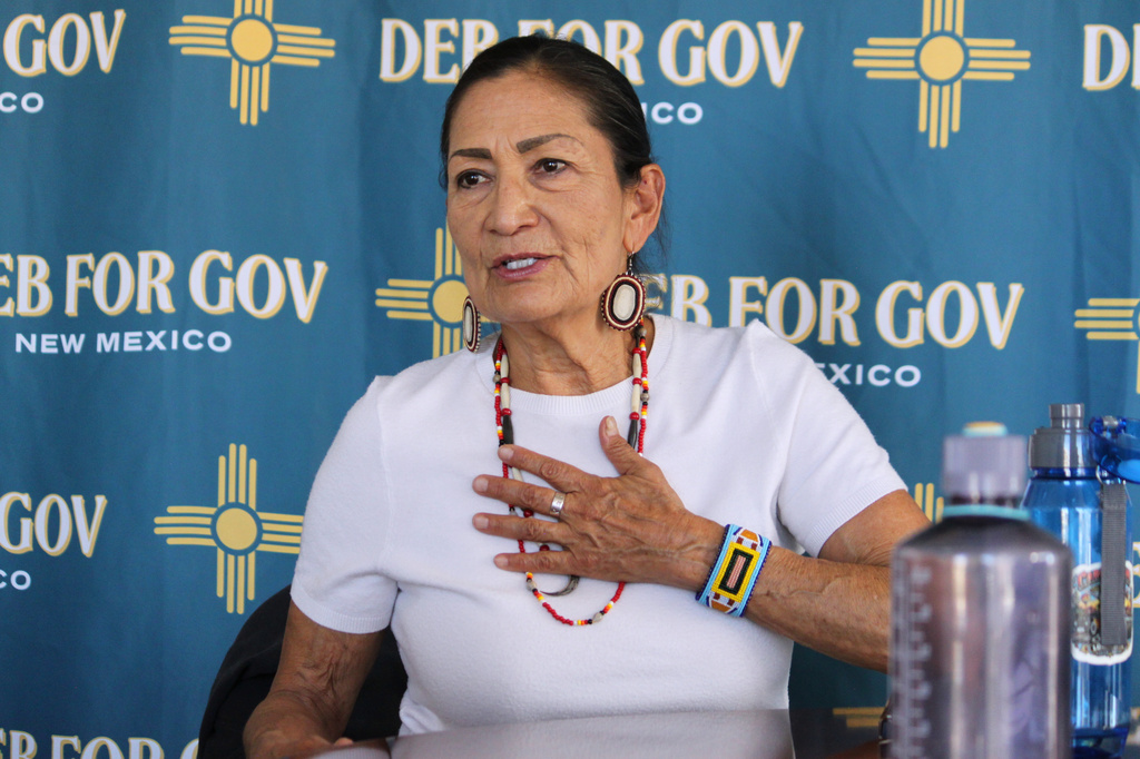 In this photo taken with a smartphone, Democratic gubernatorial nominee Deb Haaland answers questions during an interview at her campaign headquarters in Albuquerque, N.M., on Friday, Oct. 9, 2026. (AP Photo/Susan Montoya Bryan)