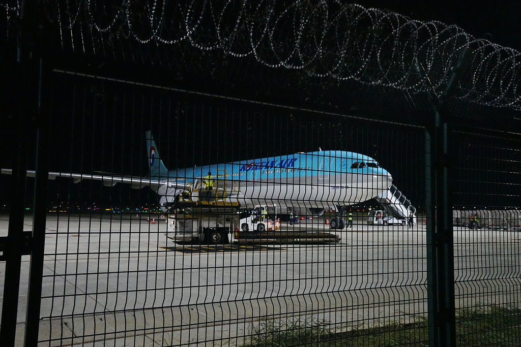 A Korean Air plane is seen at the VIP section for chartered planes at Techo International Airport in Kandal province, Cambodia, Friday, Oct. 17, 2025. (AP Photo/Heng Sinith)