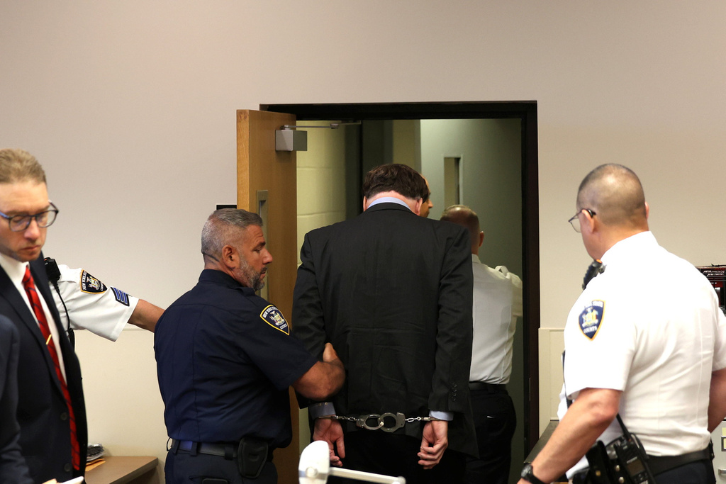 Gilgo Serial Killer Rex Heuermann is escorted away after being sentenced by Judge Timothy Mazzei at Suffolk County Court in Riverhead, N.Y., on Wednesday, June 17, 2026. (James Carbone/Newsday via AP, Pool)