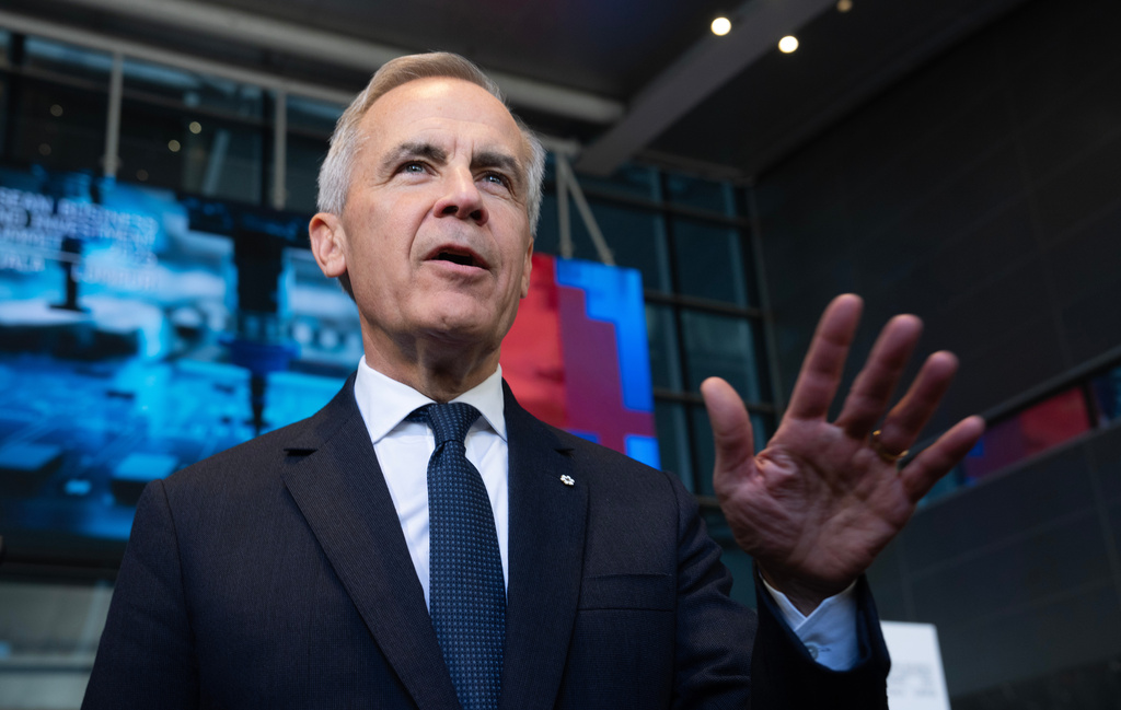 Canada Prime Minister Mark Carney makes a brief statement to reporters as he leaves the ASEAN Business and Investment Summit in Kuala Lumpur, Malaysia, Sunday, Oct. 26, 2025. (Adrian Wyld /The Canadian Press via AP)