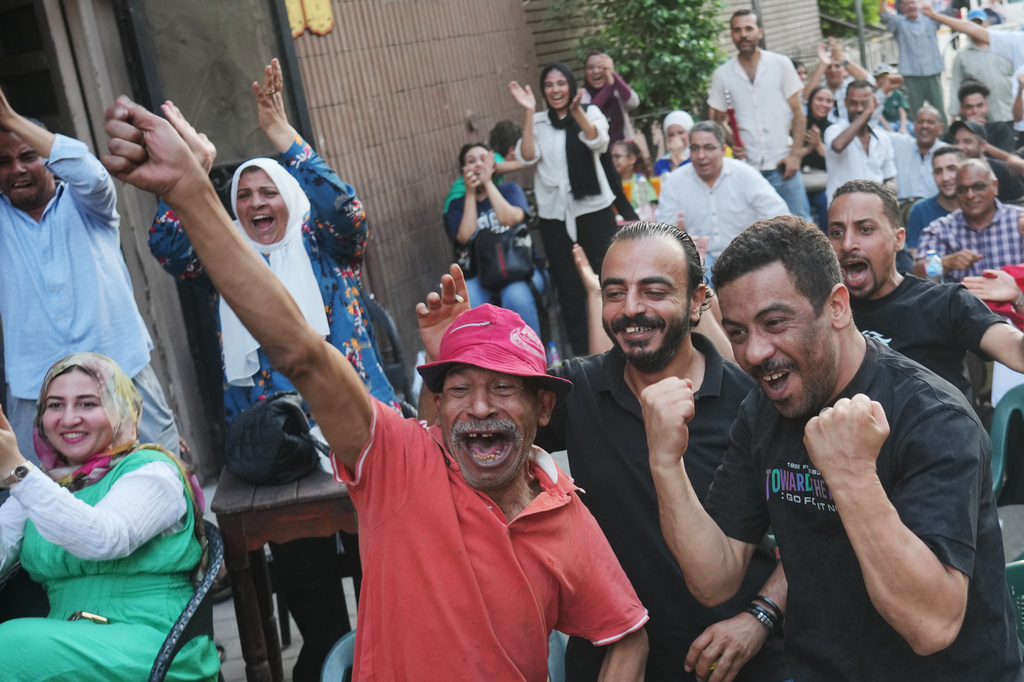 Fans celebrate Egypt's goal on Argentina during a watch party for the World Cup knockout stage, in Cairo, Egypt, Tuesday, July 7, 2026. (AP Photo/Amr Nabil)
