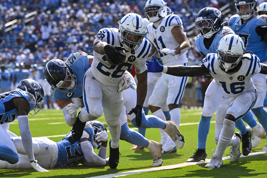 Indianapolis Colts running back Jonathan Taylor (28) runs in for a touchdown against the Tennessee Titans during the second half of an NFL football game Sunday, Sept. 21, 2025, in Nashville, Tenn. (AP Photo/John Amis)