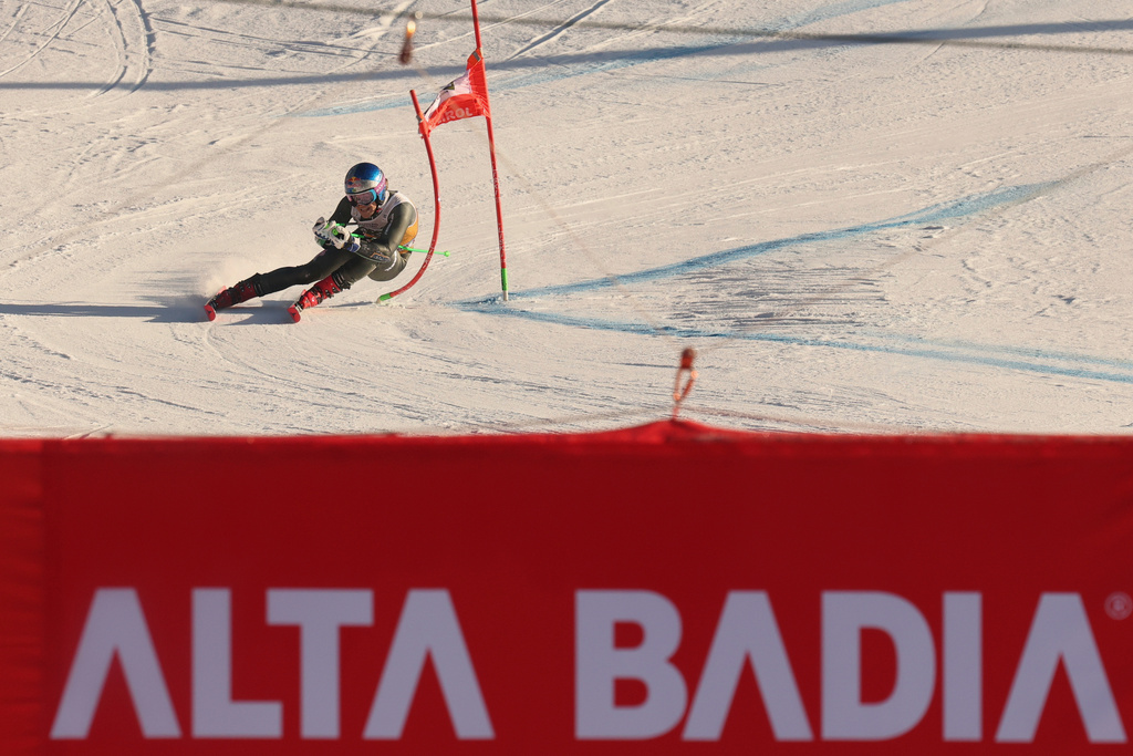Brazil's Lucas Pinheiro Braathen speeds down the course towards the finish area of an alpine ski, men's World Cup Giant slalom, in Alta Badia, Italy, Sunday Dec. 21, 2025. (AP Photo/Alessandro Trovati)