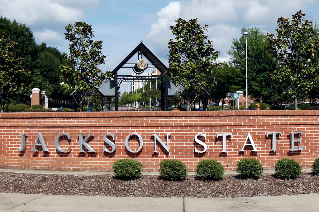 FILE - A sign marks the west entrance at Jackson State University in Jackson, Miss., May 31, 2017. (AP Photo/Rogelio V. Solis, File)