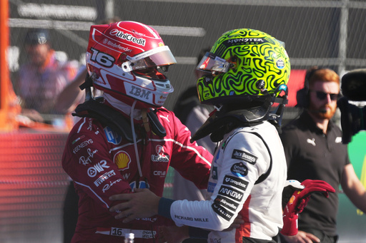 McLaren driver Lando Norris of Britain, right, is congratulated by Ferrari driver Charles Leclerc of Monaco, second placed, after winning the Formula One Mexico Grand Prix auto race at the Hermanos Rodriguez race track in Mexico City, Sunday, Oct. 26, 2025. (AP Photo/Moises Castillo) McLaren driver Lando Norris of Britain, right, is congratulated by Ferrari driver Charles Leclerc of Monaco, second placed, after winning the Formula One Mexico Grand Prix auto race at the Hermanos Rodriguez race track in Mexico City, Sunday, Oct. 26, 2025. (AP Photo/Moises Castillo)