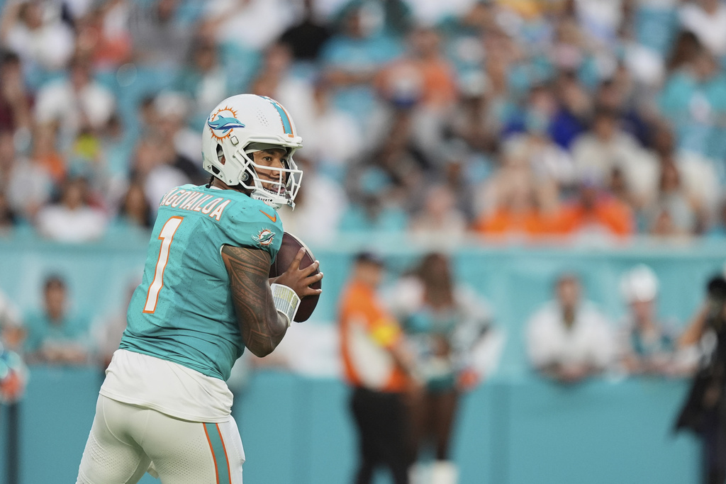 Miami Dolphins quarterback Tua Tagovailoa (1) looks to pass the football during the first half of an NFL preseason football game against the Jacksonville Jaguars, Saturday, Aug. 23, 2025, in Miami Gardens, Fla. (AP Photo/Rebecca Blackwell)