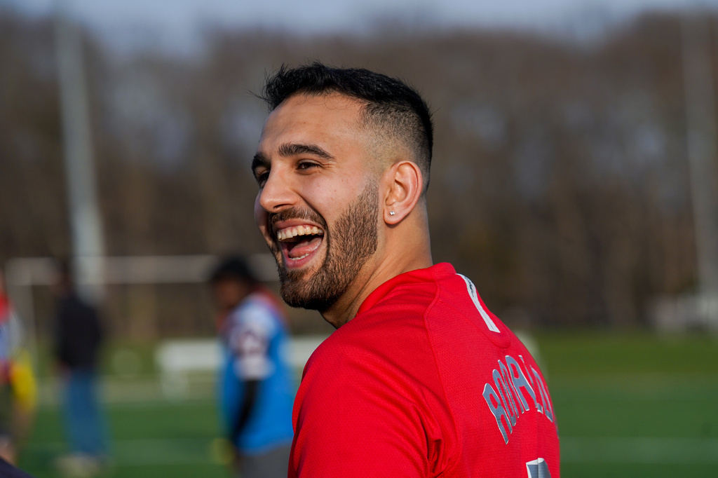 Tehran native and Stony Brook University graduate student Arad Ershad laughs while playing soccer at Stony Brook University in Stony Brook, N.Y., Friday, April 3, 2026. (AP Photo/Ryan Murphy)