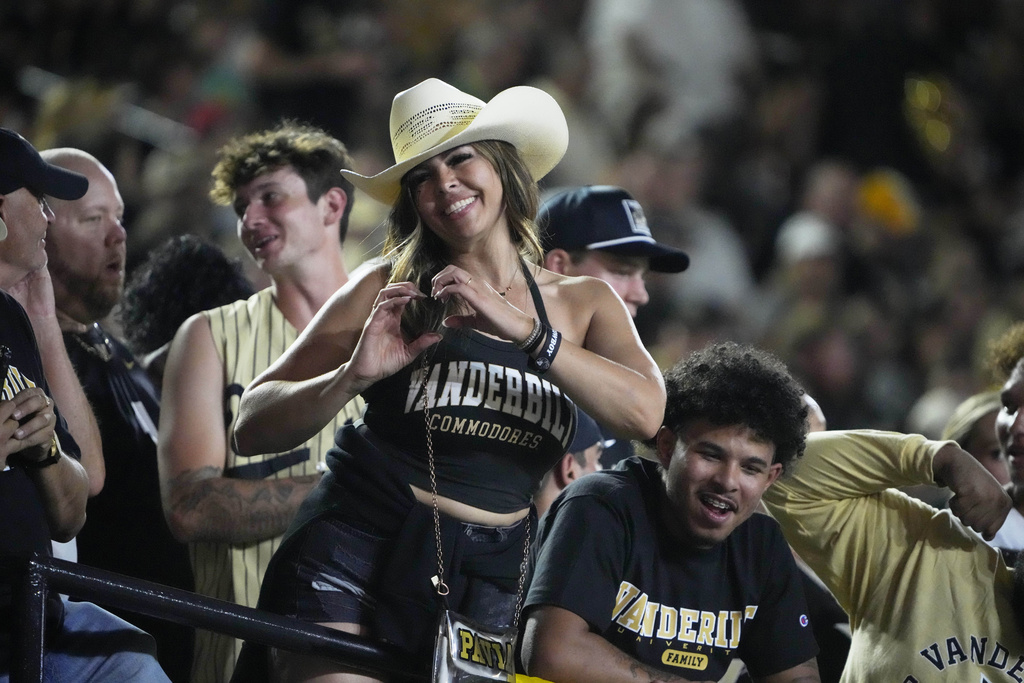 Antoinette Padilla, mother of Vanderbilt quarterback Diego Pavia, cheers during the first half of an NCAA college football game against Georgia State, Saturday, Sept. 20, 2025, in Nashville, Tenn. (AP Photo/George Walker IV)