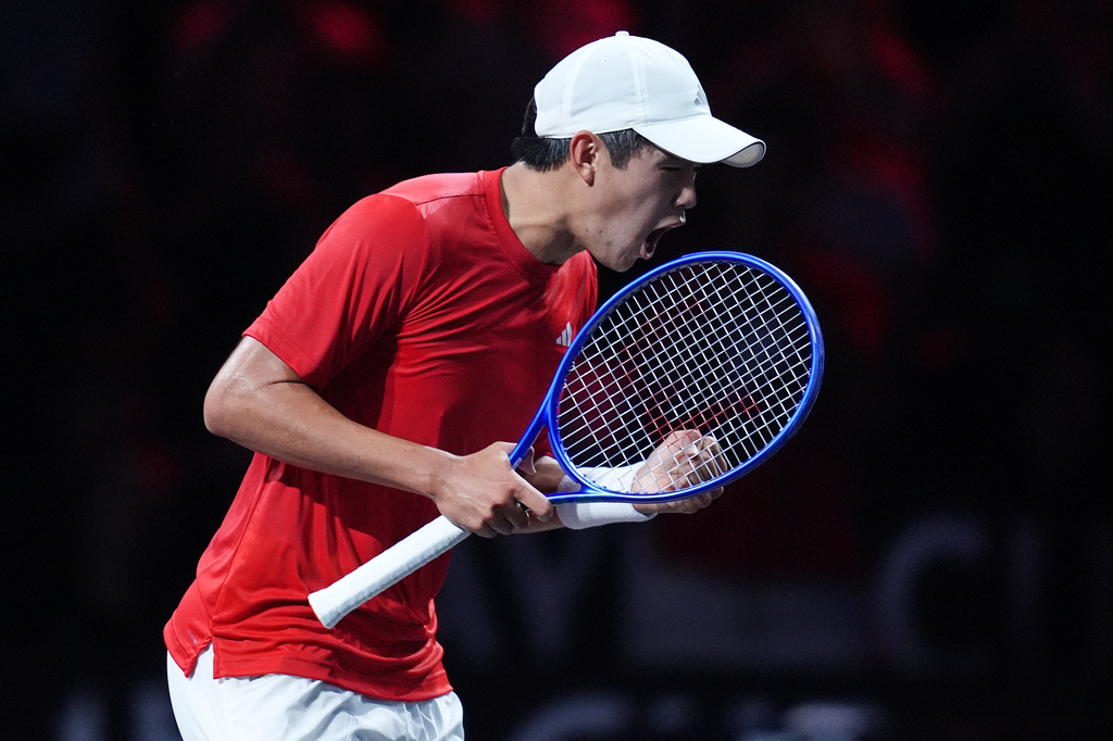 Team World's Learner Tien celebrates after beating Team Europe's Flavio Cobolli in a Laver Cup tennis tournament match in London, Saturday, Sept. 26, 2026. (AP Photo/Maja Smiejkowska)