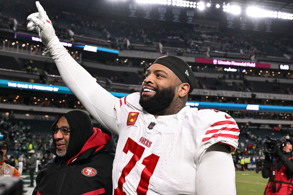 FILE - San Francisco 49ers offensive tackle Trent Williams (71) celebrates as he walks off the field after an NFL wild card playoff football game against the Philadelphia Eagles, Jan. 11, 2026, in Philadelphia. (AP Photo/Terrance Williams, File)