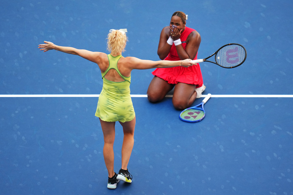 Katerina Siniakova, of the Czech Republic, left, and Taylor Townsend, of the United States, right, celebrate winning the women's doubles final of the U.S. Open tennis championships against Ashlyn Krueger, of the United States, and Robin Montgomery, of the United States, Friday, Sept. 11, 2026, in New York. (AP Photo/Kirsty Wigglesworth)
