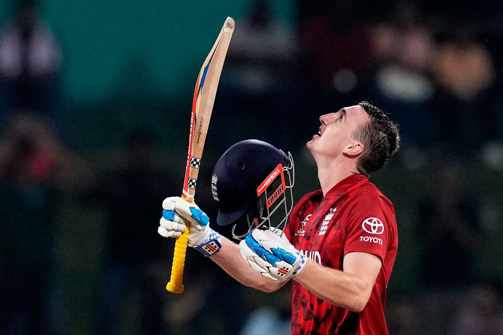 England's captain Harry Brook celebrates his century during the T20 World Cup cricket match between England and Pakistan in Pallekele, Sri Lanka, Tuesday, Feb. 24, 2026. (AP Photo/Eranga Jayawardena)