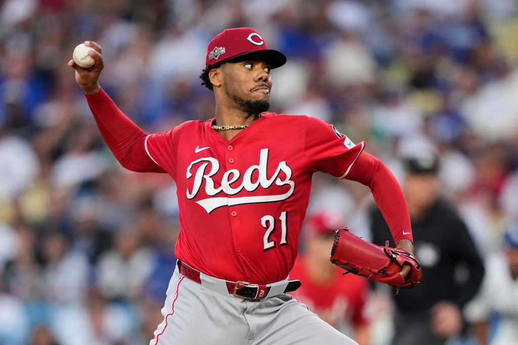 Cincinnati Reds starting pitcher Hunter Greene throws to a Los Angeles Dodgers batter during the first inning in Game 1 of the National League Wild Card baseball playoff series against the Cincinnati Reds, Tuesday, Sept. 30, 2025, in Los Angeles. (AP Photo/Mark J. Terrill)