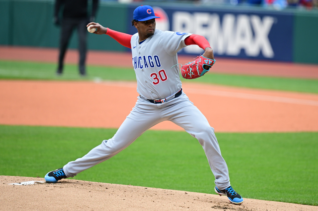 Chicago Cubs starting pitcher Edward Cabrera delivers against the Cleveland Guardians during the first inning of a baseball game, Sunday, April 5, 2026, in Cleveland. (AP Photo/David Dermer)