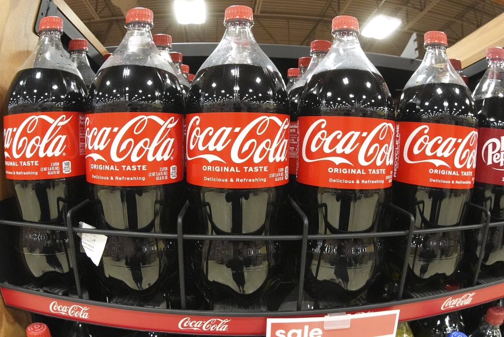 FILE -Coca-Cola 2-liter bottles are pictured at a market in Homestead, Pa., Feb. 24, 2025. (AP Photo/Gene J. Puskar, File)
