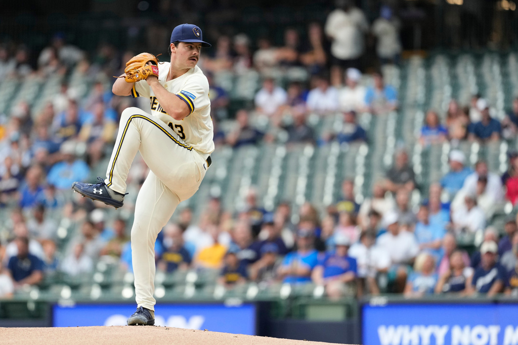 Milwaukee Brewers' Logan Henderson pitches during the first inning of a baseball game against the Pittsburgh Pirates, Tuesday, Aug. 4, 2026, in Milwaukee. (AP Photo/Aaron Gash)