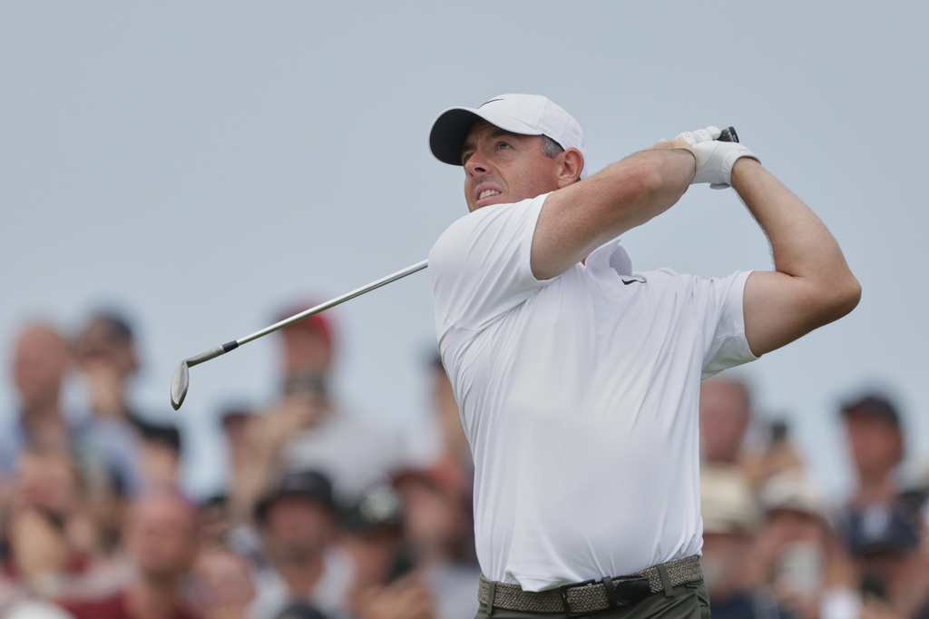 Rory McIlroy of Northern Ireland plays his tee shot on the 7th hole during the third day of the British Open Golf championships at Royal Birkdale golf club, in Southport, England, Saturday, July 18, 2026. (AP Photo/Peter Morrison)