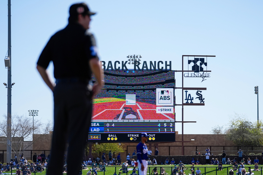 FILE - A replay from the Automated Ball-Strike System plays after a play was challenged during the second inning of a spring training baseball game between the Seattle Mariners and the Los Angeles Dodgers, Tuesday, Feb. 25, 2025, in Phoenix. (AP Photo/Ashley Landis, File)