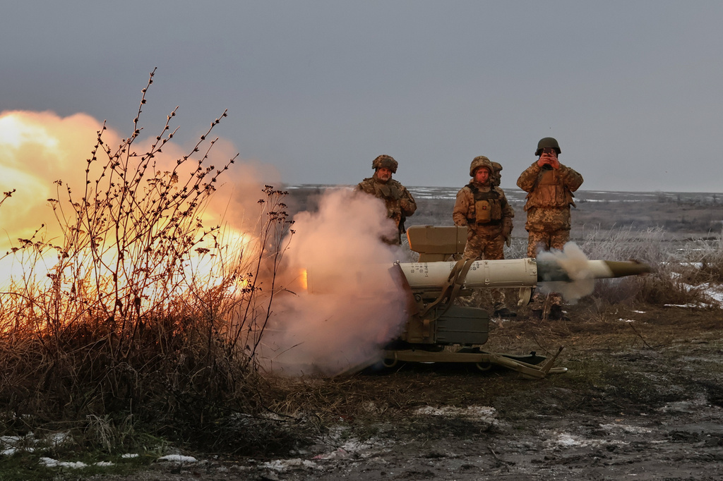 In this photo provided by Ukraine's 65th Mechanized Brigade press service, soldiers fire an anti-tank missile system during a drill close to the frontline on the site of heavy battles with the Russian troops in the Zaporizhzhia region, Ukraine, Sunday, Jan. 4, 2026. (Andriy Andriyenko/Ukraine's 65th Mechanized Brigade via AP)