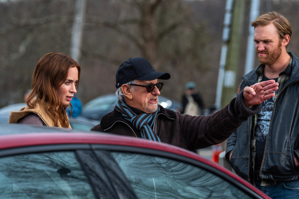 This image released by Universal Pictures shows director Steven Spielberg, center, with actors Emily Blunt, left, and Wyatt Russell on the set of "Disclosure Day." (Niko Tavernise/Universal Pictures and Amblin Entertainment via AP)