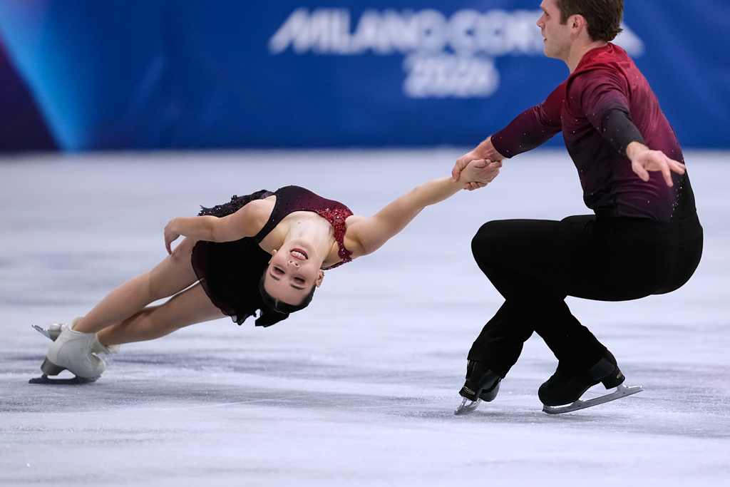 Lia Pereira and Trennt Michaud of Canada compete during the pairs figure skating short program at the 2026 Winter Olympics, in Milan, Italy, Sunday, Feb. 15, 2026. (AP Photo/Ashley Landis)