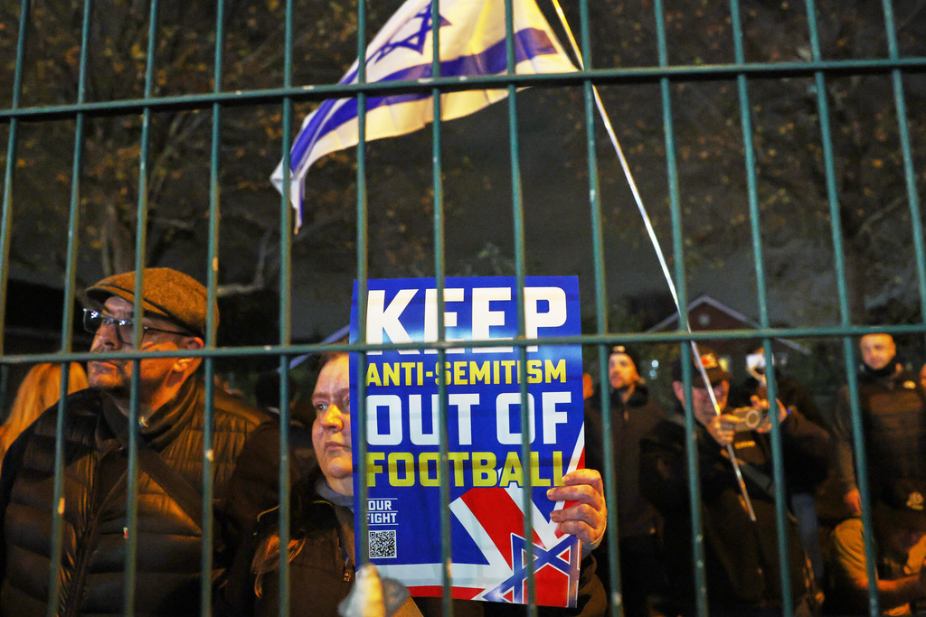 People demonstrate ahead of the Europa League soccer match between Aston Villa and Maccabi Tel Aviv in Birmingham, England, Thursday, Nov. 6, 2025. (AP Photo/Darren Staples)