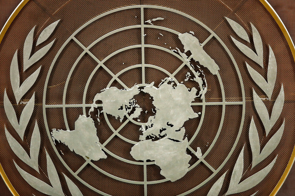 FILE - The United Nations logo is seen at the General Assembly hall at U.N. headquarters, Sept. 21, 2021. (Eduardo Munoz/Pool Photo via AP, file)