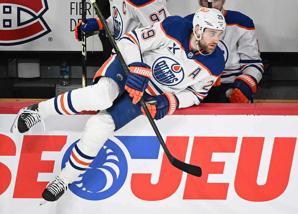 Edmonton Oilers' Leon Draisaitl (29) comes off the bench during the first period of an NHL hockey game, in Montreal, Sunday, Dec. 14, 2025. (Graham Hughes/The Canadian Press via AP)